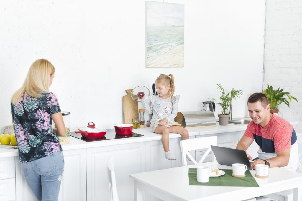 happy family in the kitchen searching a new Baxi Boiler